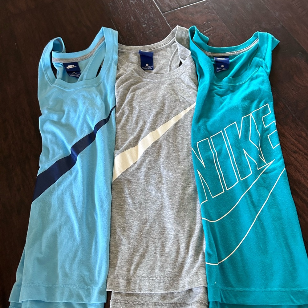 NIKE ladies gym tops.